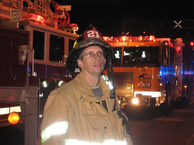 Firefighter Bud Charlton surveying the scene.